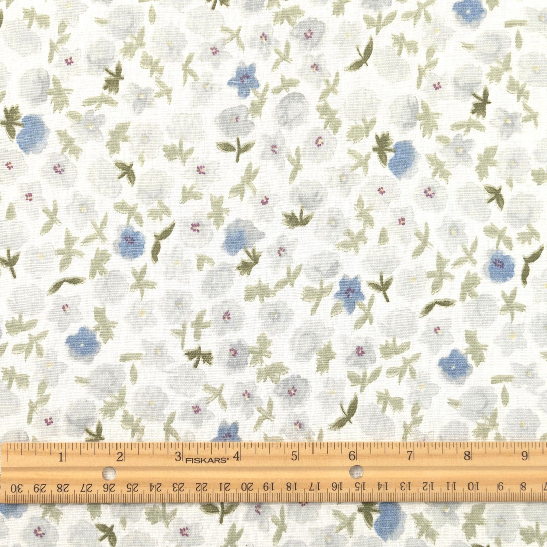 Linen and cotton blend fabric with soft blue floral pattern and green stems, 56-inch wide lightweight fabric