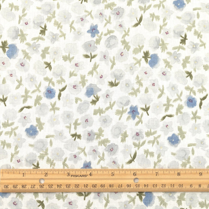 Linen and cotton blend fabric with soft blue floral pattern and green stems, 56-inch wide lightweight fabric