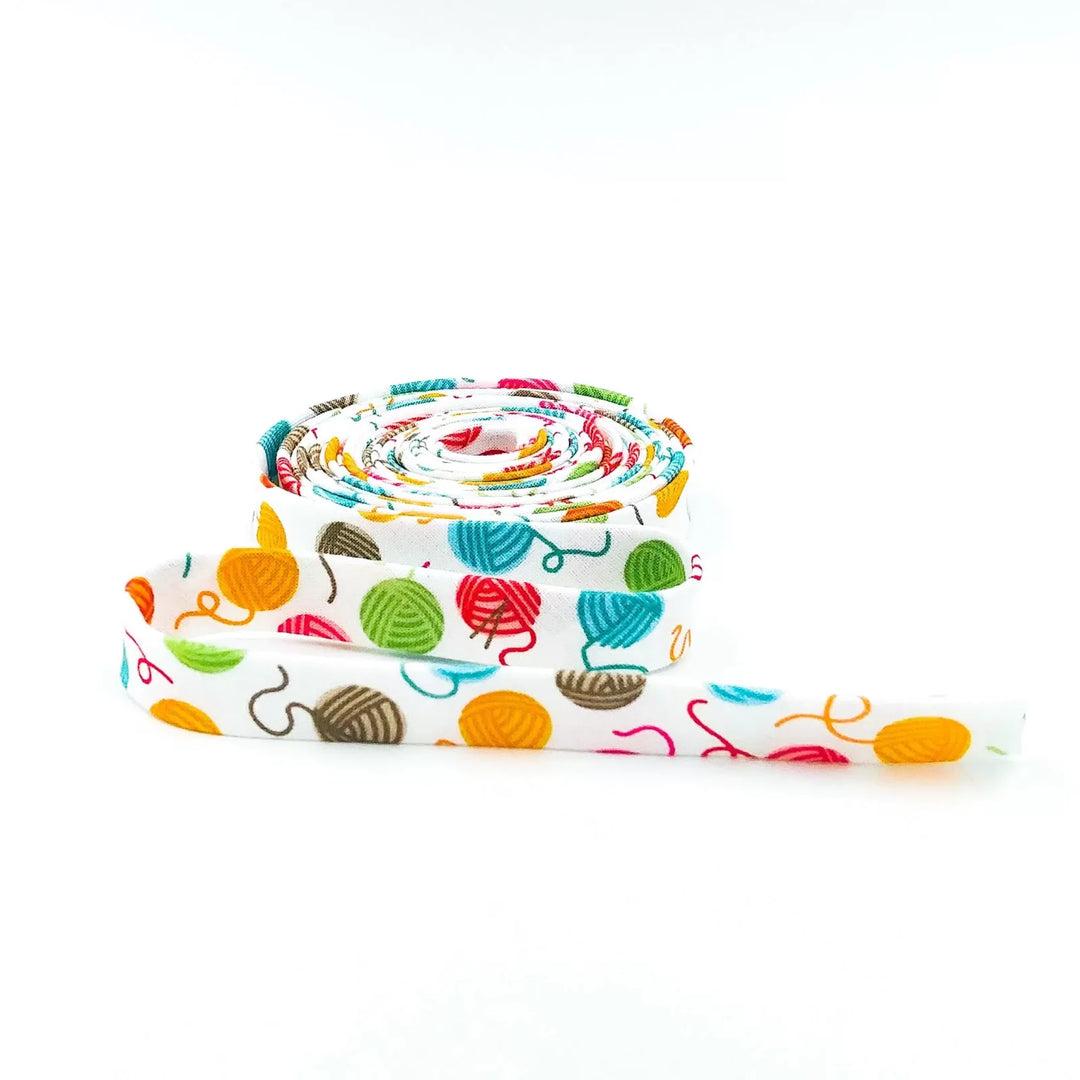 Colorful yarn ball double fold bias tape - 1/2" cotton sewing trim for whimsical garment edges