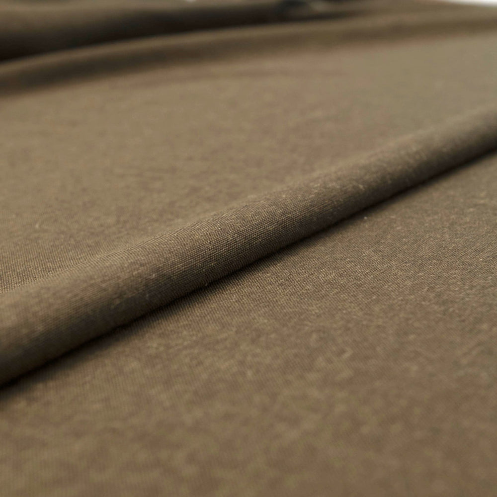 Close-up image of Linen/Rayon Yarn Dye fabric in fern green showing yarn-dyed texture and subtle color variations.
