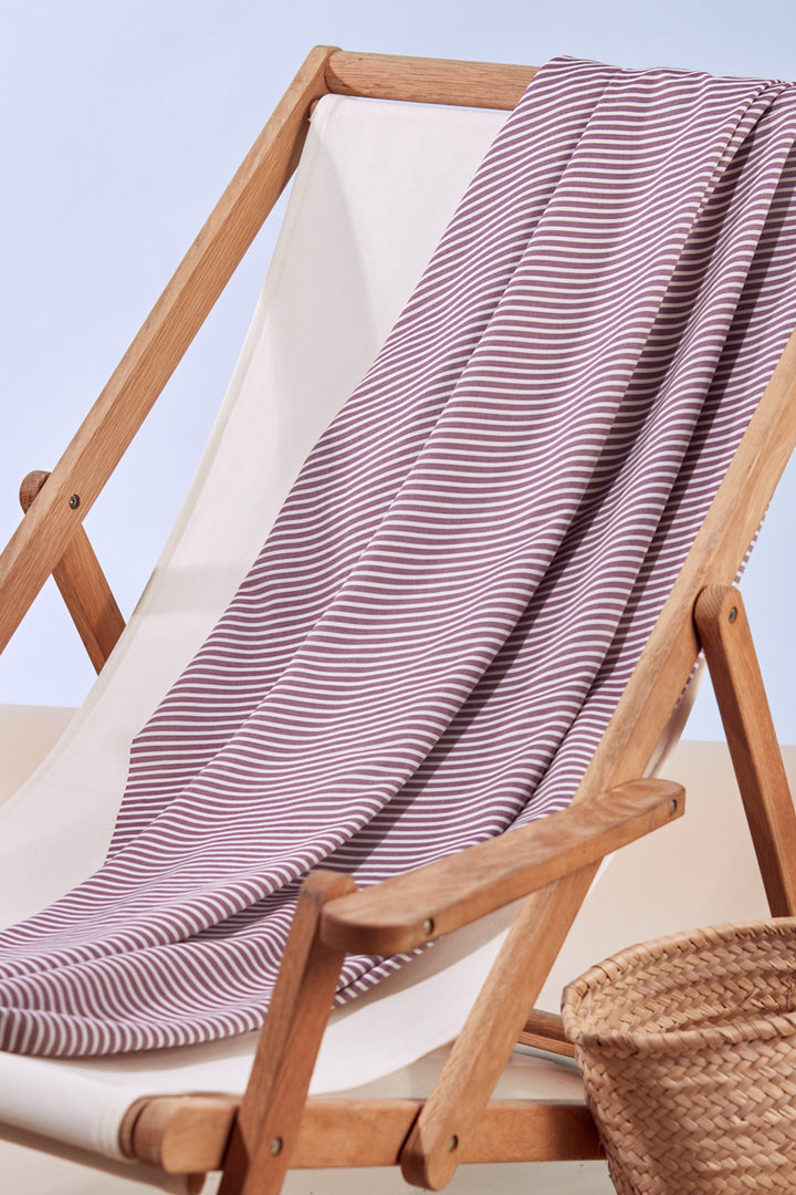 Viscose woven stripe fabric in Sunray Dahlia - Raspberry and White, ideal for dresses and blouses