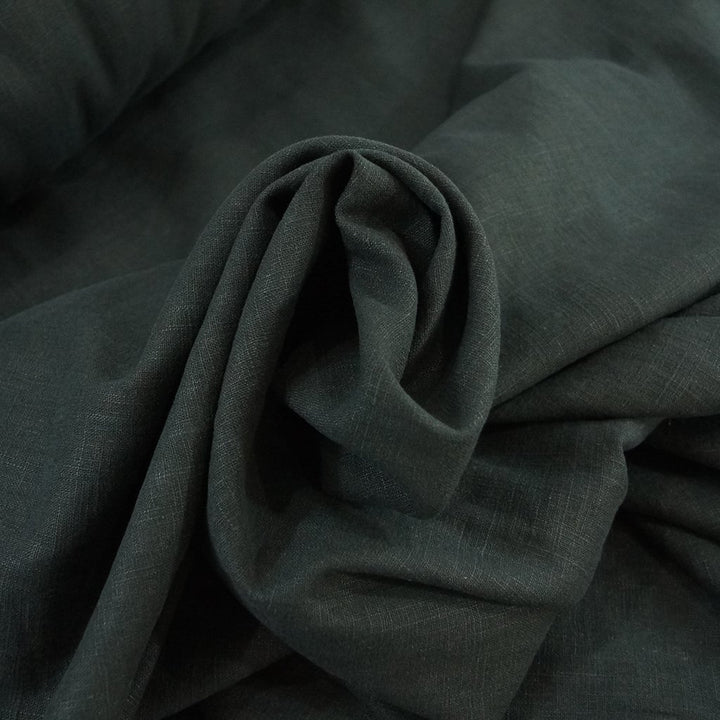 Luxurious soft wash black linen fabric for tailored jackets and dresses