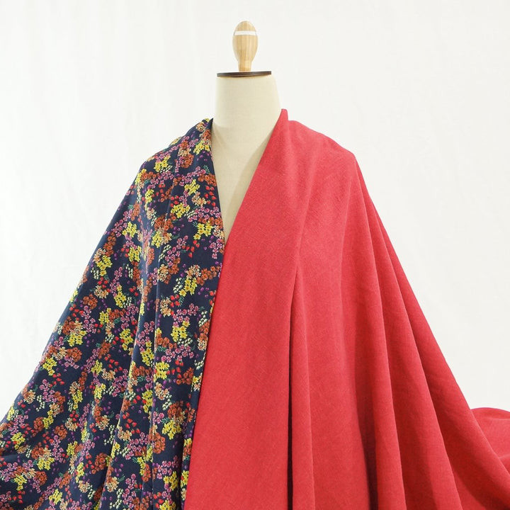 Soft Wash Linen in vibrant cayenne red color, 100% pre-washed linen fabric perfect for sewing dresses, jackets, and handmade garments.

