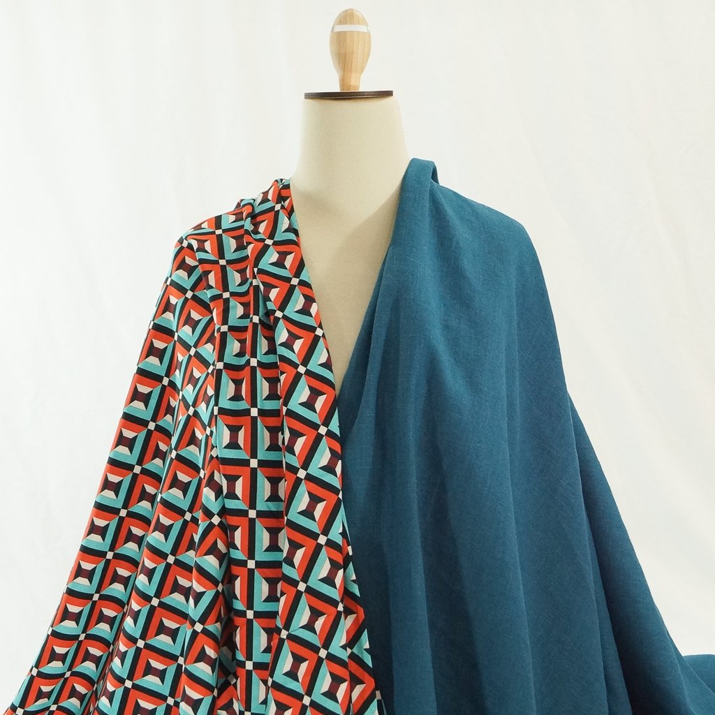 Soft Wash Linen fabric in vibrant marine blue color, 100% pre-washed linen ideal for sewing dresses, jackets, and lightweight garments.

