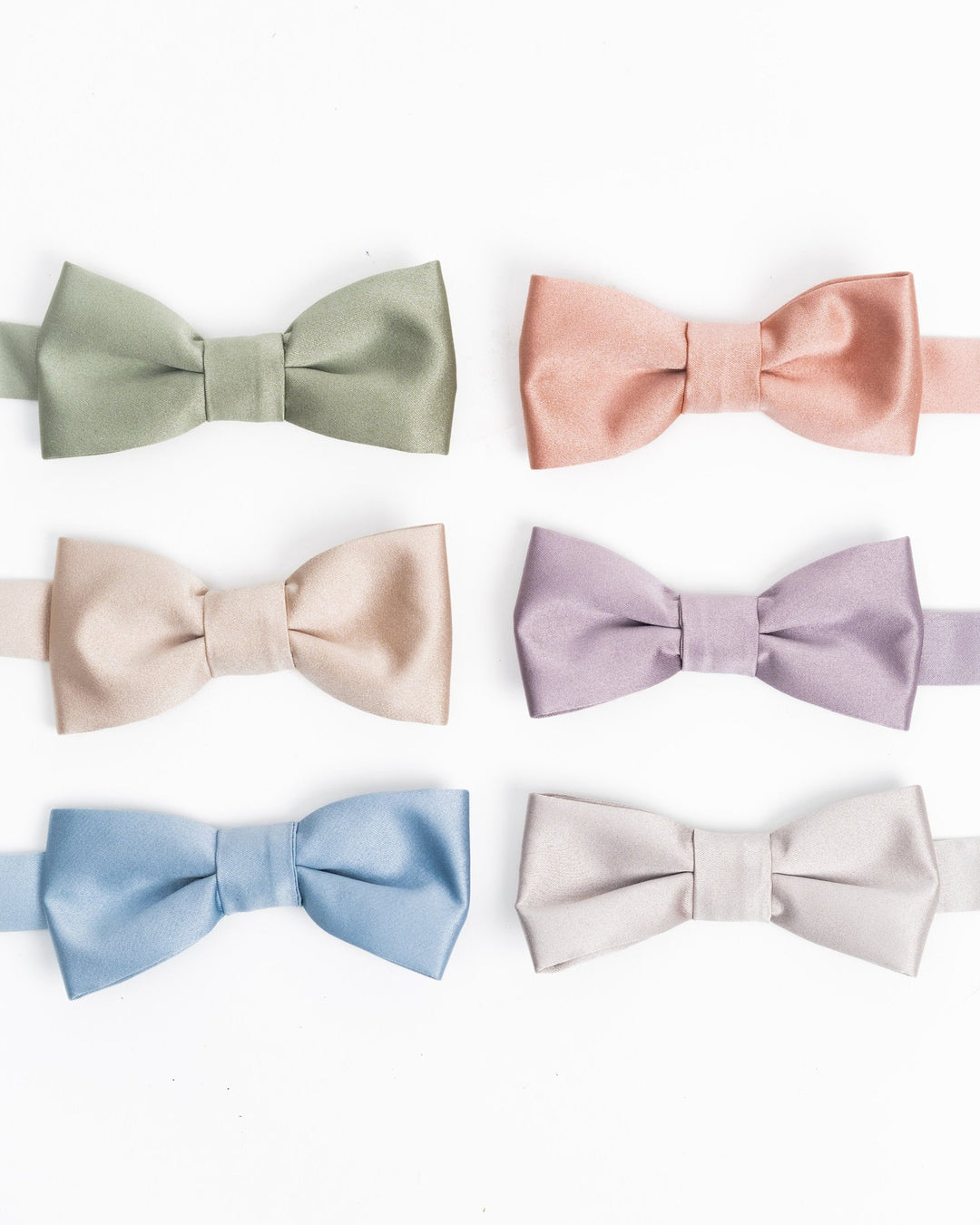 Handcrafted satin bowtie in soft spring/summer hues, perfect for weddings and formal events