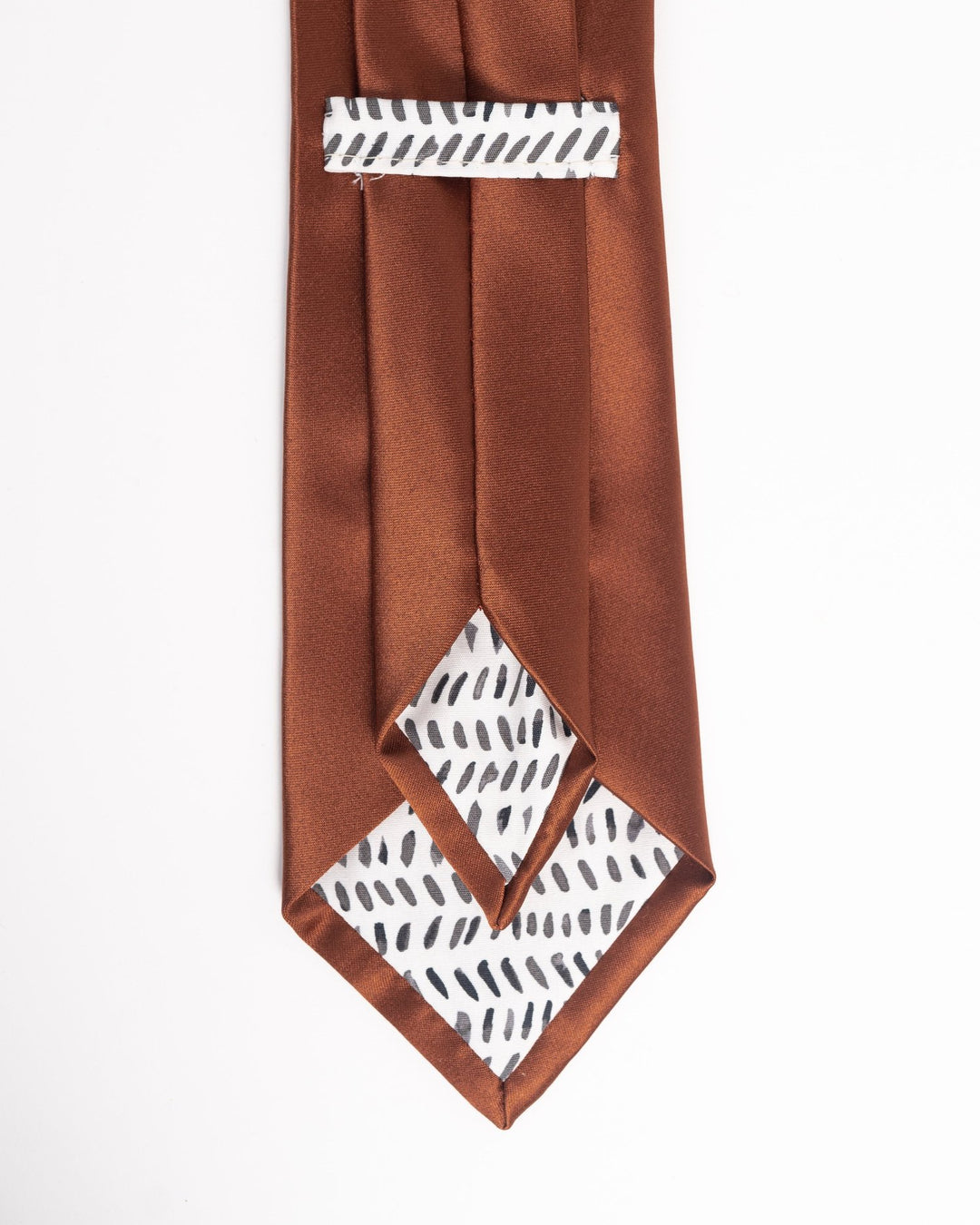 Handmade men's satin necktie in fall/winter colors with a polished finish.
