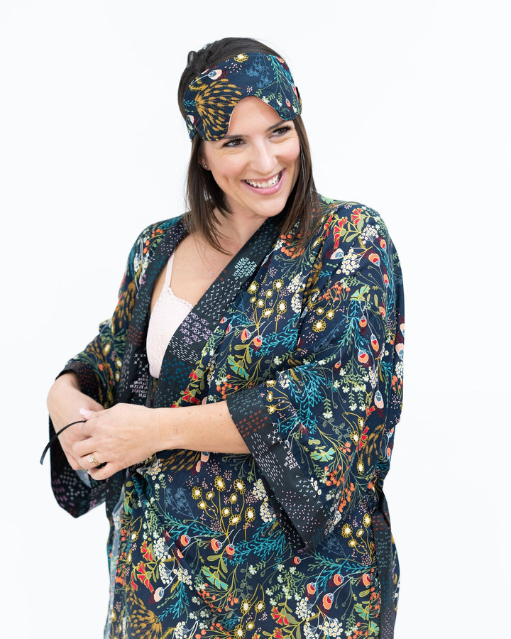 Luxurious silk satin sleep eyemask with soft elastic band for comfortable fit, paired with Signature robes.
