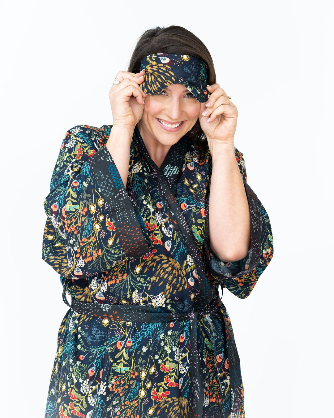 Luxurious silk satin sleep eyemask with soft elastic band for comfortable fit, paired with Signature robes.
