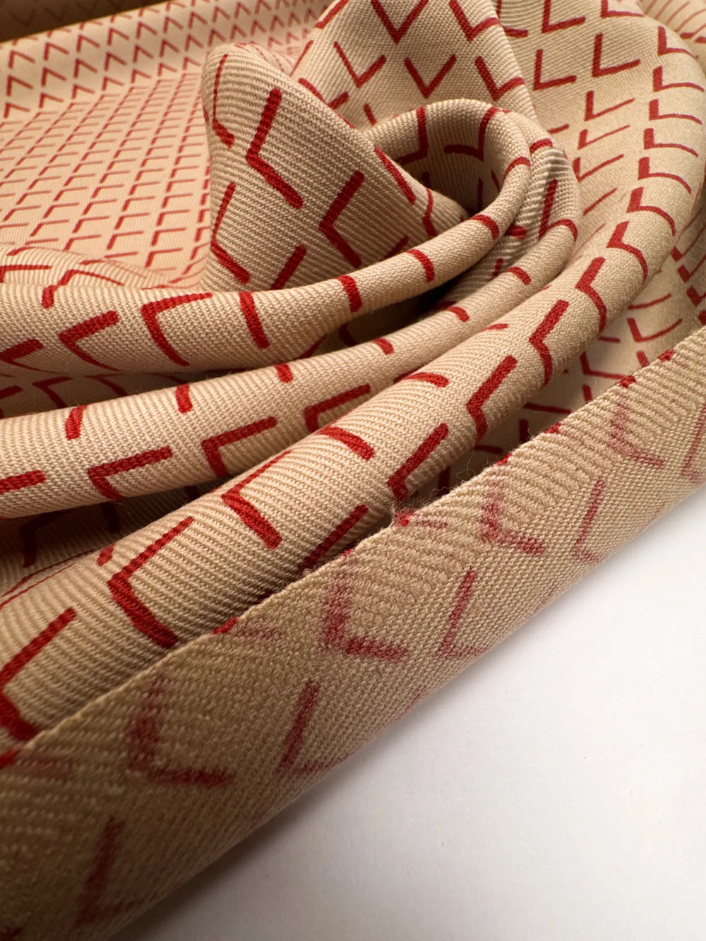 Wool Suiting fabric in Beige with Red Diamonds, 100% Wool, ideal for suits and coats.