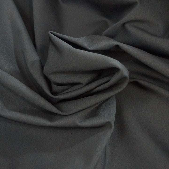 Black Endurance Repreve recycled polyester spandex fabric, eco-friendly activewear material with stretch, moisture-wicking, and UV protection
