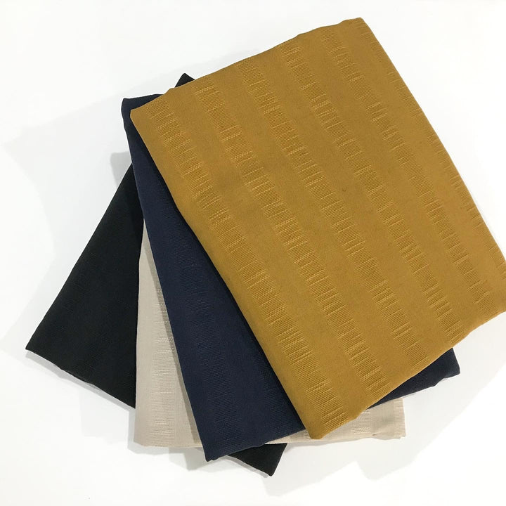 Textured Stripe Cotton and Linen Blend – Breathable 85% cotton and 15% linen fabric with textured stripes, perfect for skirts, pants, and dresses.