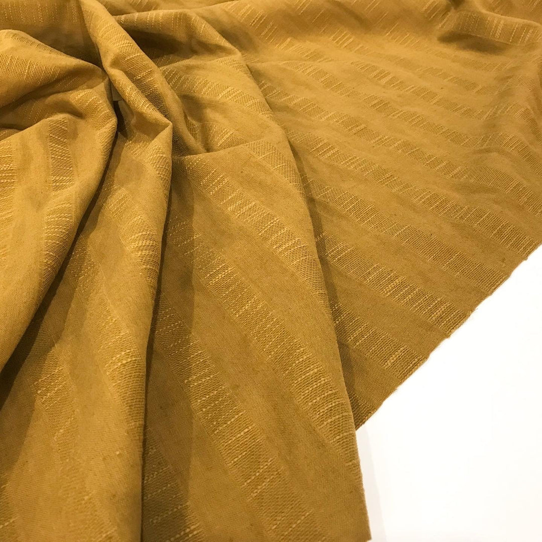 Textured Stripe Cotton and Linen Blend – Breathable 85% cotton and 15% linen fabric with textured stripes, perfect for skirts, pants, and dresses.