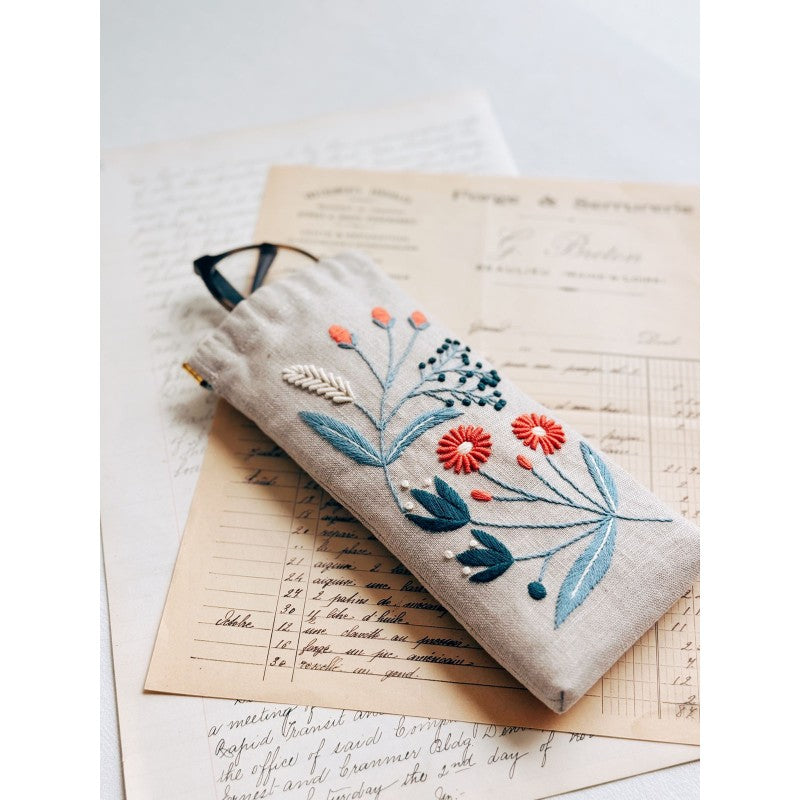 Wildflower Eyeglass Case Kit with floral motif by Alice Makabe, including flex frame and embroidery transfer.