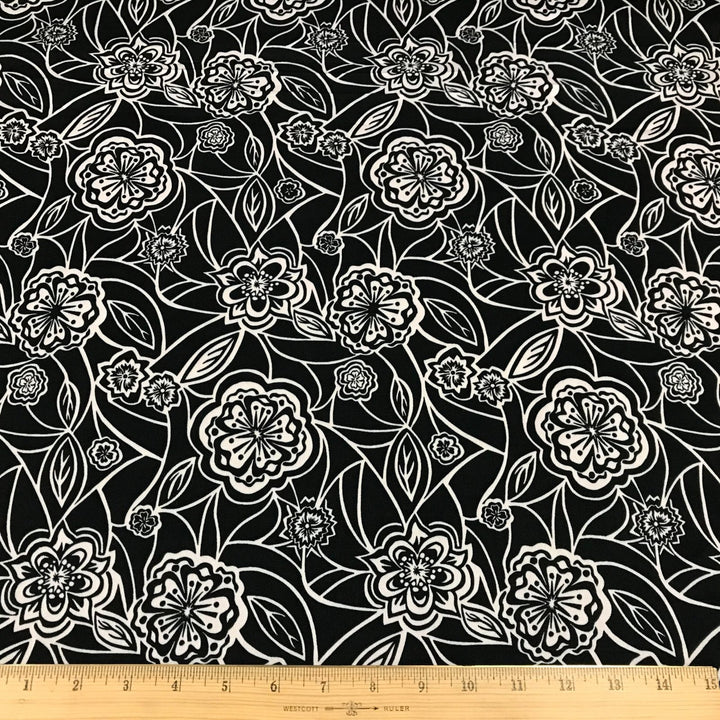Organic Tencel Twill Rowdy Patch Black fabric with whimsical digital print, eco-friendly GOTS-certified inks, fluid drape, and luxury twill texture