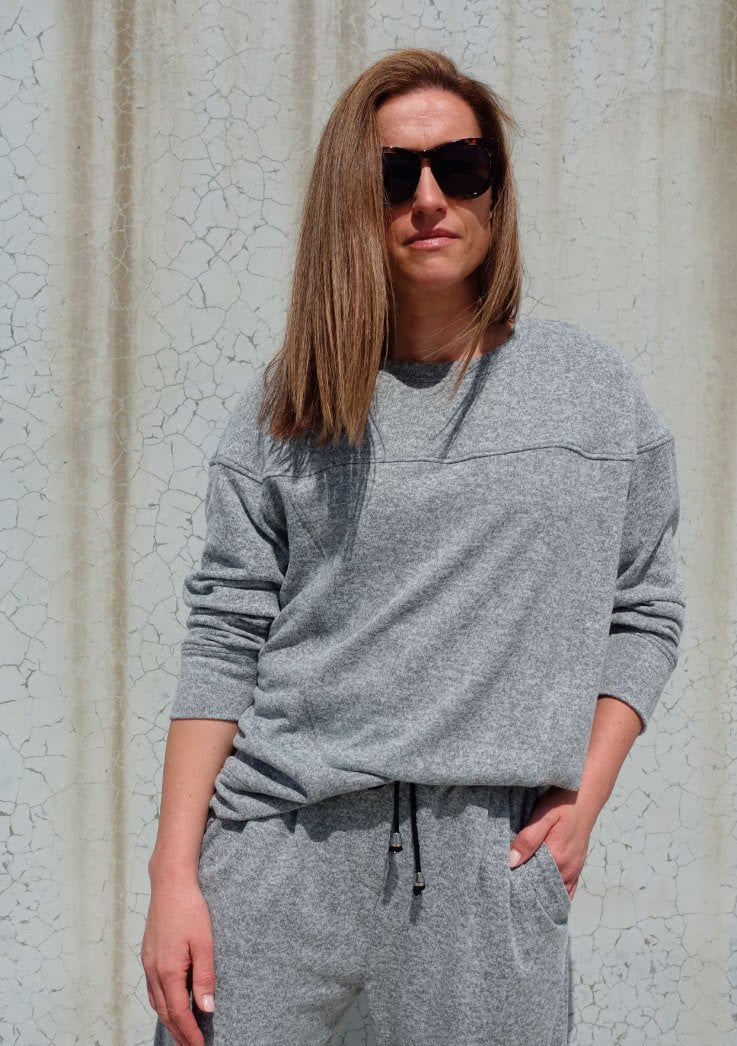Style Arc Carlsson Sweater sewing pattern with extended shoulders, rounded yoke, and angled hip band design