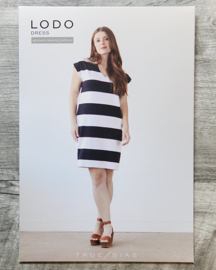True Bias Lodo Dress deep V-neck cocoon silhouette in knit fabric