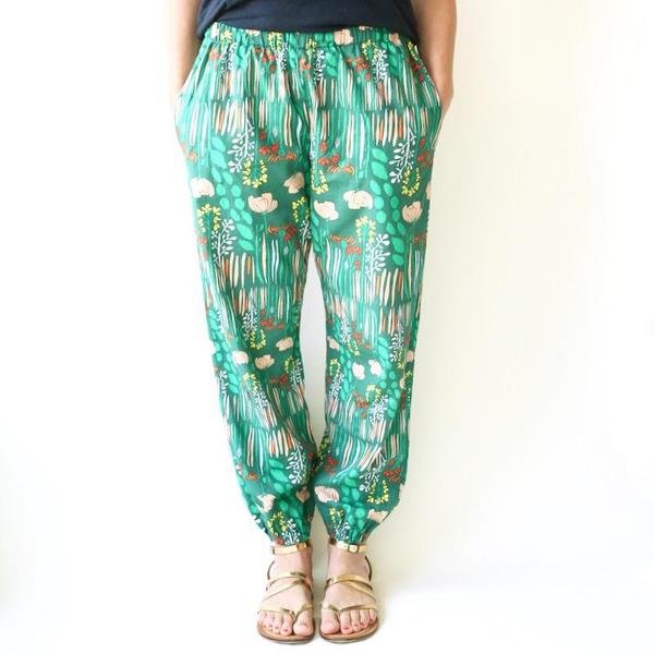 Made by Rae Luna Pants sewing pattern with tapered leg, inseam pockets, and loose comfortable fit in multiple fabrics