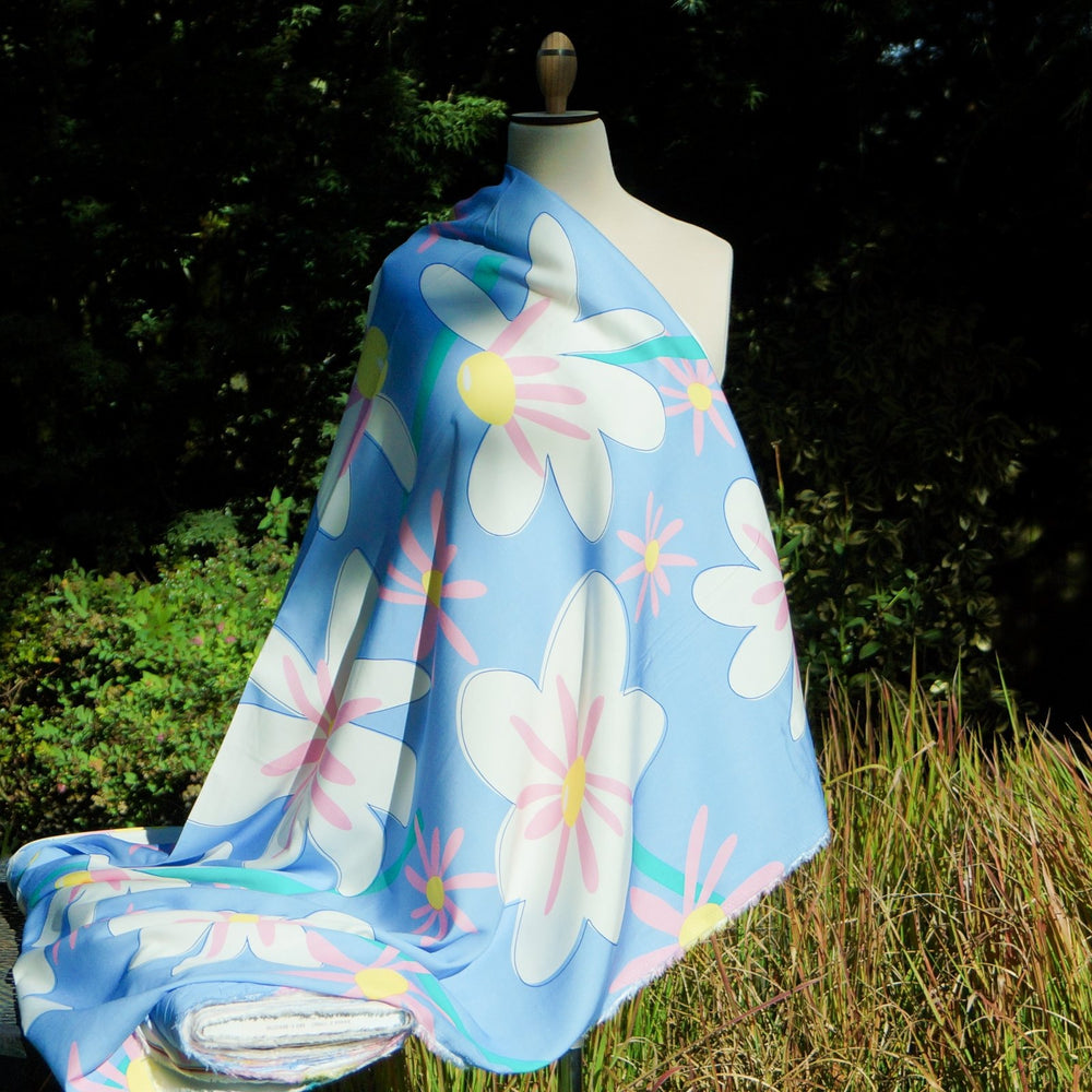 Rayon Twill Daisy Daydream fabric with pastel floral print, soft flowing 54-inch width, lightweight and luxurious for sewing projects