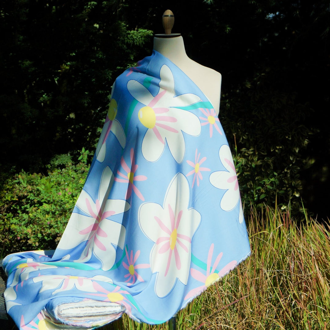 Rayon Twill Daisy Daydream fabric with pastel floral print, soft flowing 54-inch width, lightweight and luxurious for sewing projects