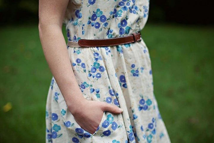 Sew Liberated Clara Dress sewing pattern with shirtwaist style, keyhole sleeves, elastic waist, inseam pockets, and full twirly skirt design