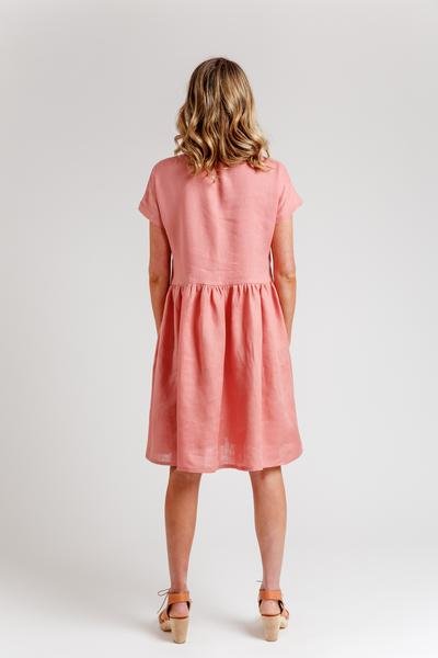 Megan Nielsen Olive sewing pattern for relaxed-fit blouse and dress with V-neck insert, optional patch pocket, and gathered skirt