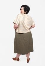 Grainline Studio Reed Skirt sewing pattern sizes 0–18 with inset and patch pockets, button front or invisible zipper closure, medium-weight fabrics