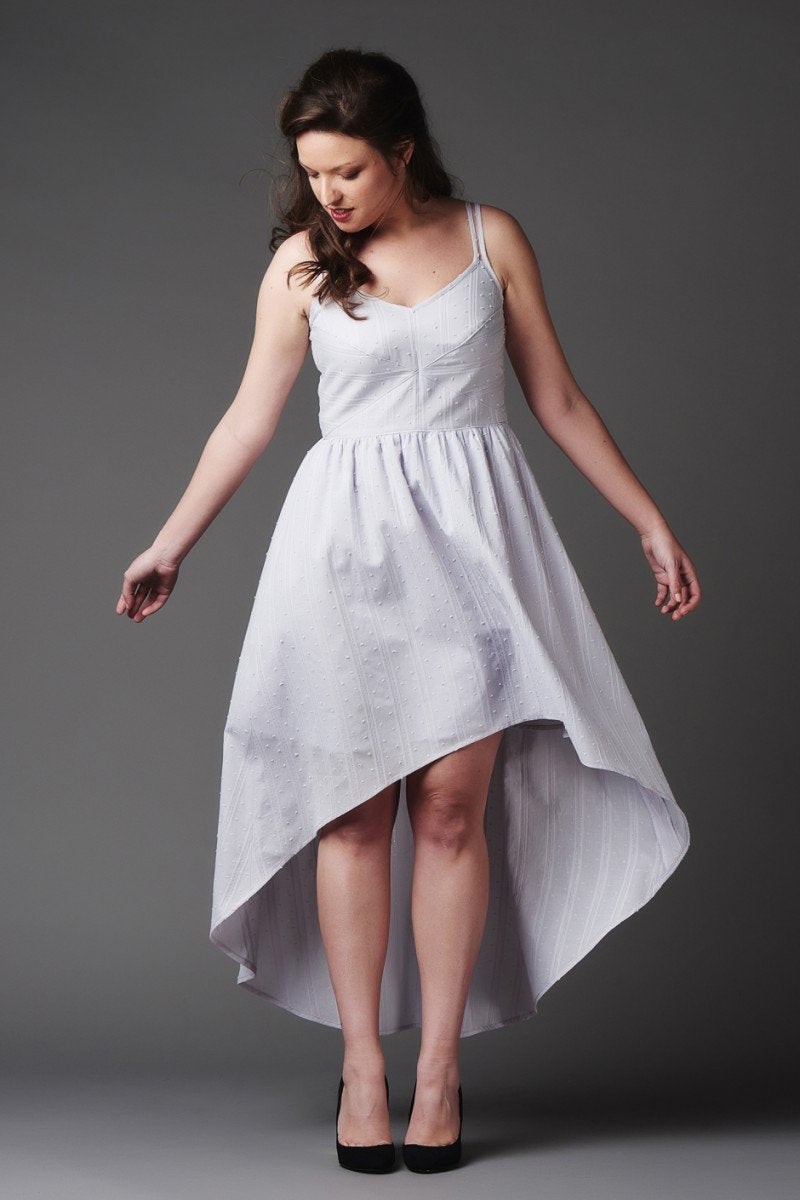 Deer and Doe Centauree Dress sewing pattern with double straps, geometric paneled bodice, above-knee or high-low hem, sizes 34–46