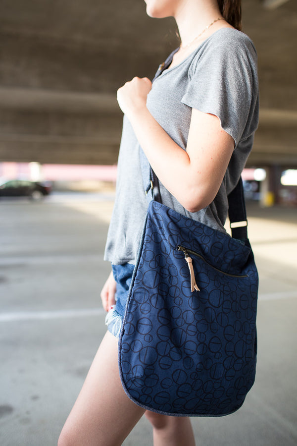 Noodlehead Trail Tote pattern with piping detail, zippered pocket, and adjustable crossbody strap