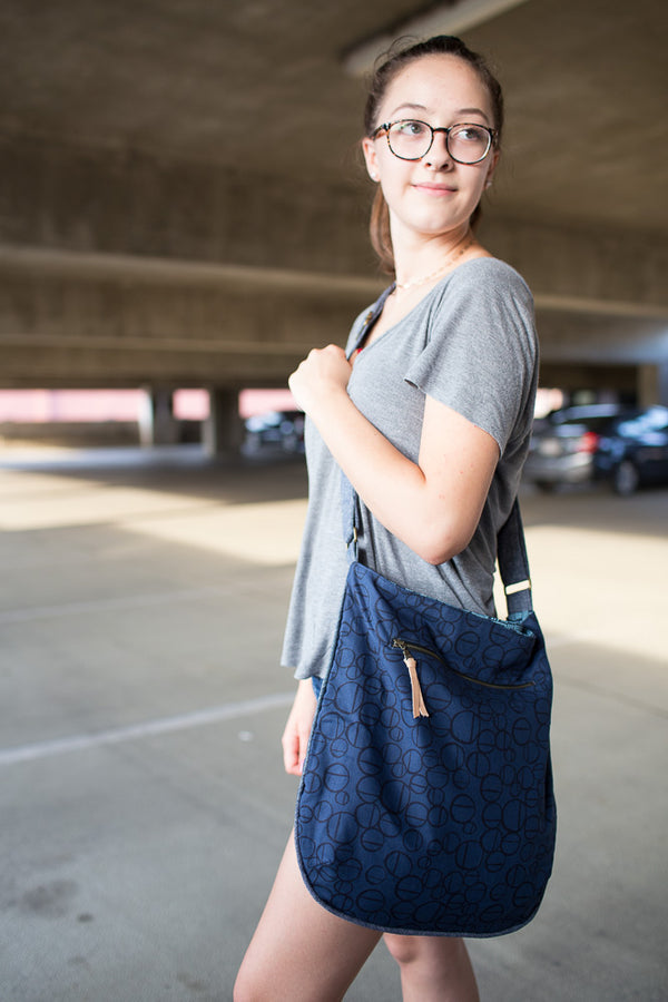 Noodlehead Trail Tote pattern with piping detail, zippered pocket, and adjustable crossbody strap