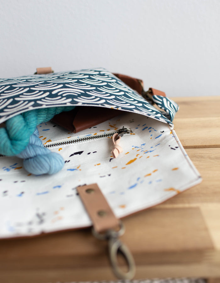 Noodlehead Haralson Bag pattern with secure zippered pockets and multiple closure options