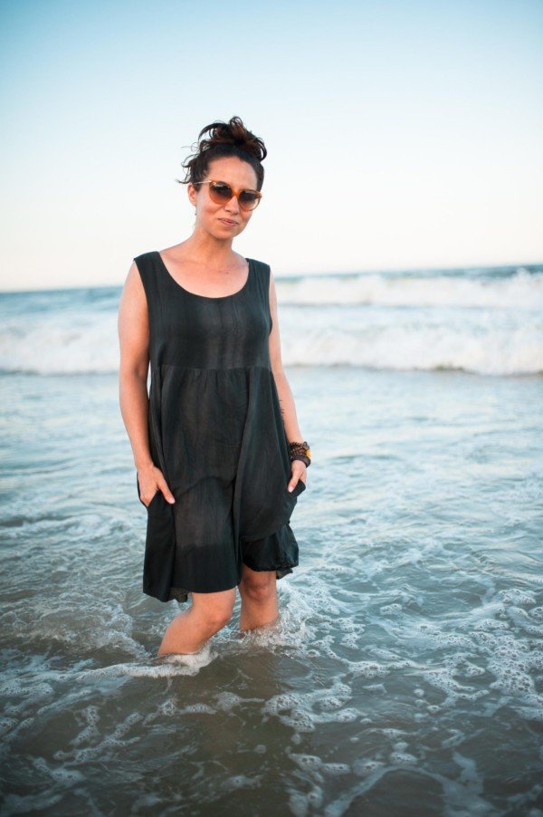 Sew Liberated Metamorphic Dress sewing pattern with reversible design, high/low waist seam, tiered skirt with patch pockets, and pinafore option