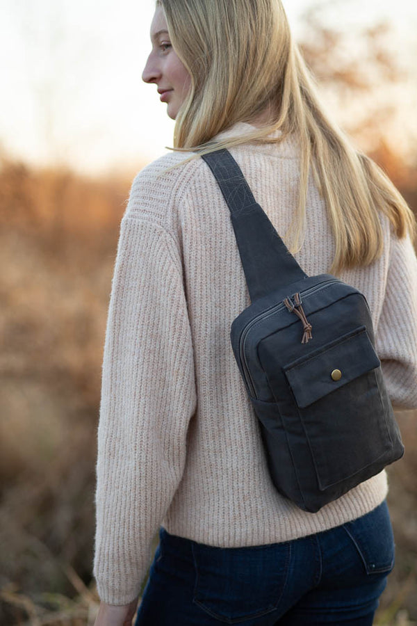 Sandhill Sling crossbody bag sewing pattern with adjustable strap and pocket options.