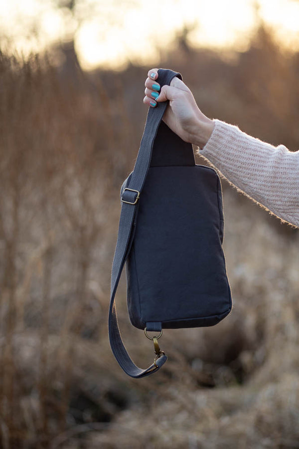 Sandhill Sling crossbody bag sewing pattern with adjustable strap and pocket options.