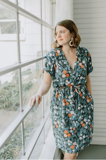 Sew to Grow Sydni Shirt-Dress pattern showing optional collar, front pleated pockets, and tie belt.