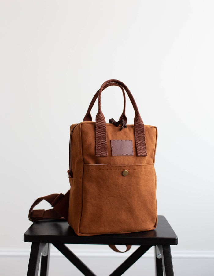 Noodlehead Making Backpack pattern in regular and mini sizes with customizable fabrics and pockets