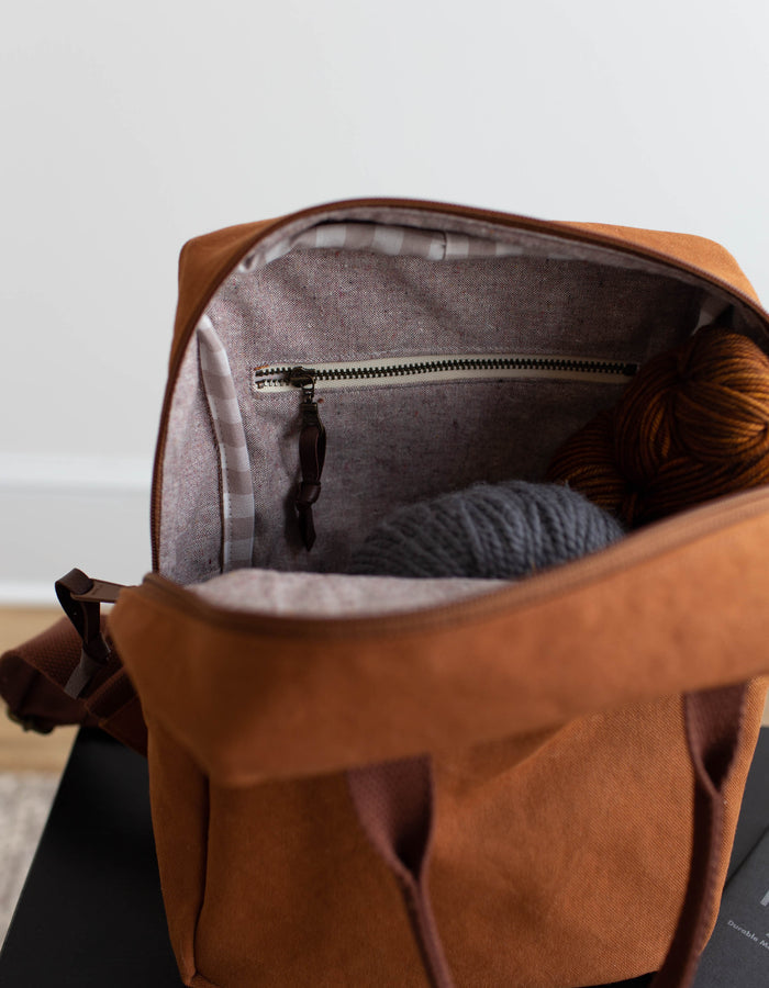 Noodlehead Making Backpack pattern in regular and mini sizes with customizable fabrics and pockets