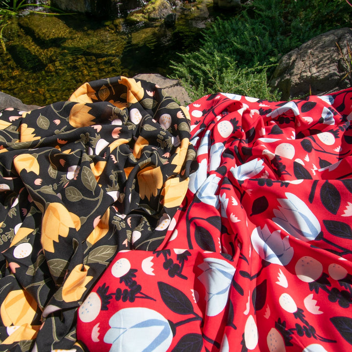 Rayon Poplin Yellow Flowers on Black Fabric, Soft Draping 100% Rayon, Perfect for Dresses, Blouses, and Sewing Projects