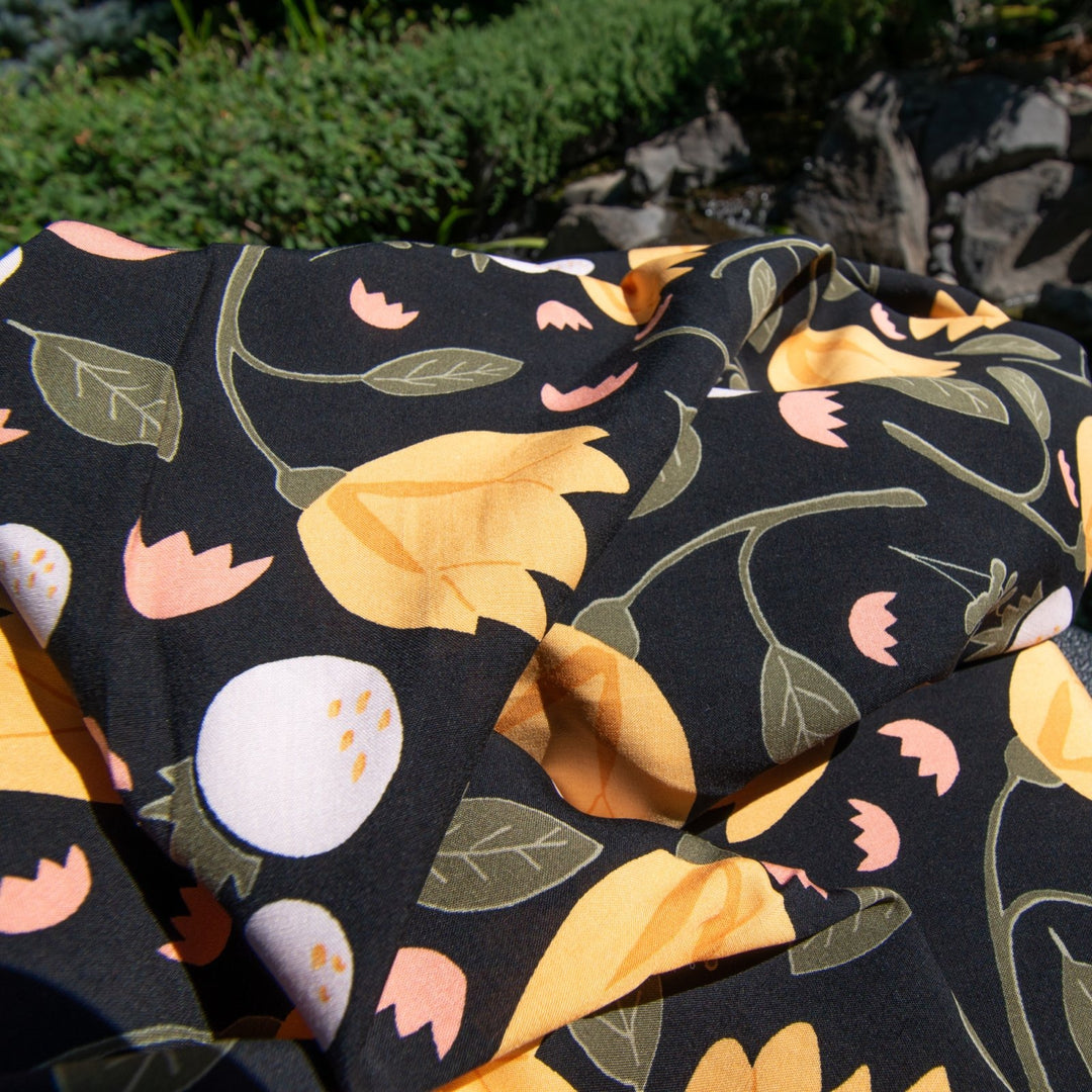 Rayon Poplin Yellow Flowers on Black Fabric, Soft Draping 100% Rayon, Perfect for Dresses, Blouses, and Sewing Projects