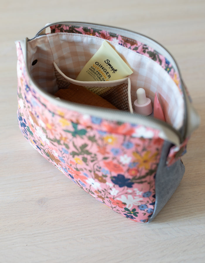 Noodlehead Plover Pouch pattern in three sizes with mesh pocket, zippered compartments, and snap detail