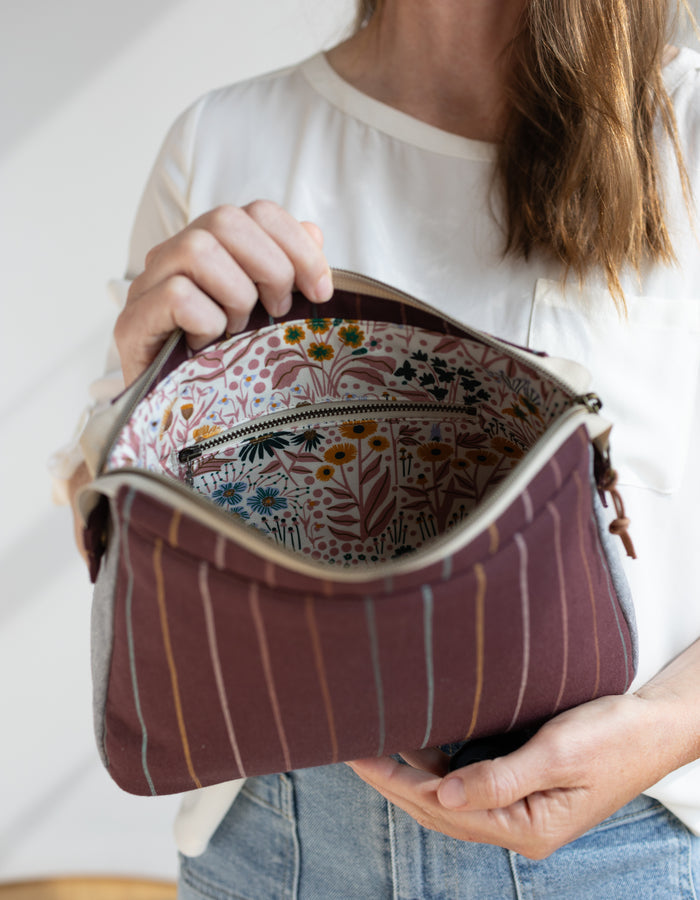 Noodlehead Plover Pouch pattern in three sizes with mesh pocket, zippered compartments, and snap detail