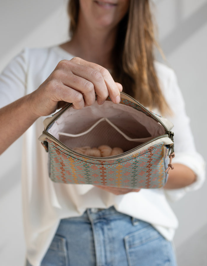 Noodlehead Plover Pouch pattern in three sizes with mesh pocket, zippered compartments, and snap detail