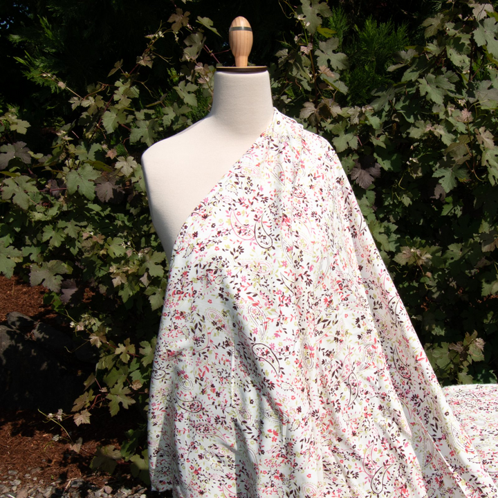 Rayon Challis Cream Paisley Floral Fabric 56-inch width with lime, eggplant, coral, and pink design
