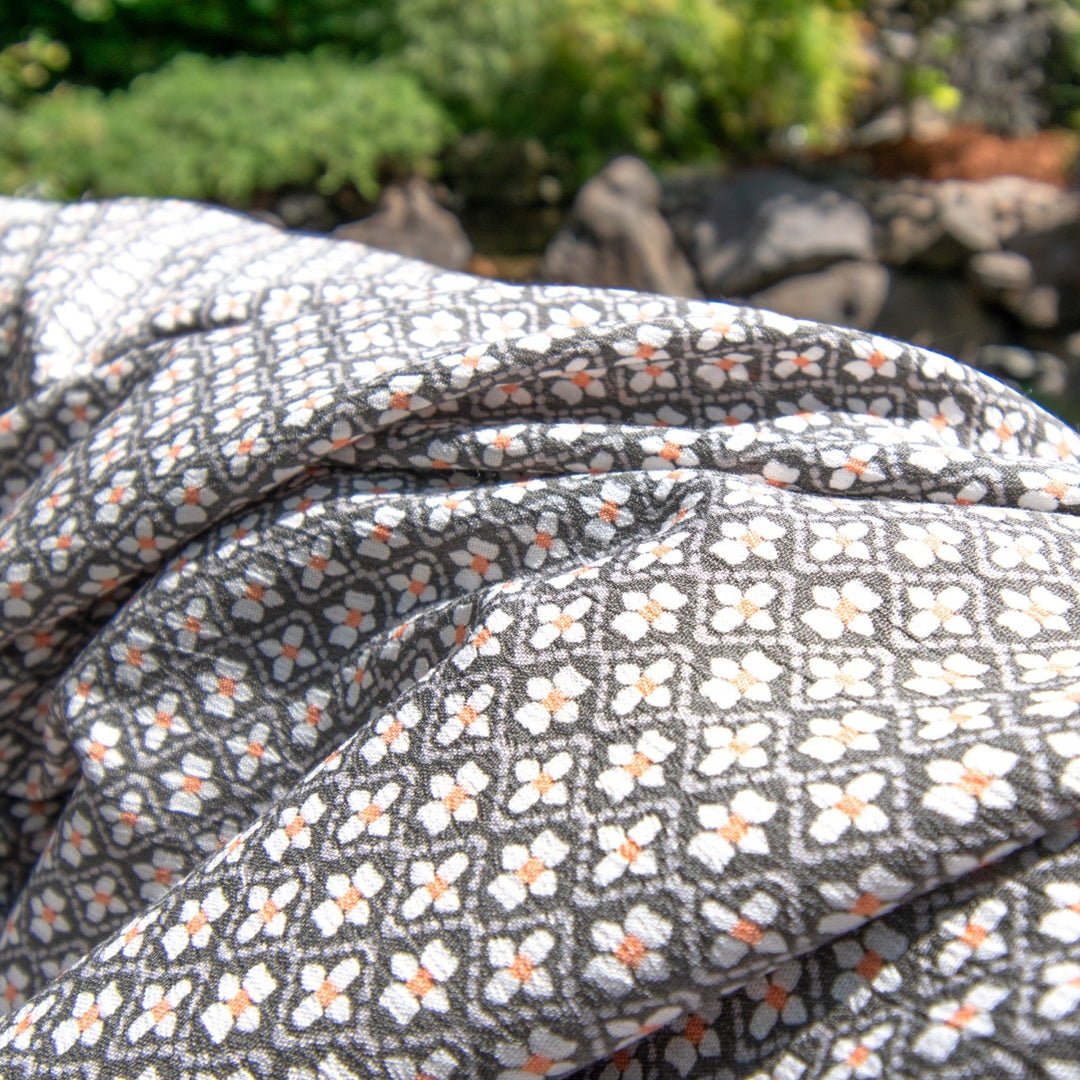 Gray Rayon Crepe Fabric with Daisy Block Pattern, Apricot Centers, 51-Inch Width