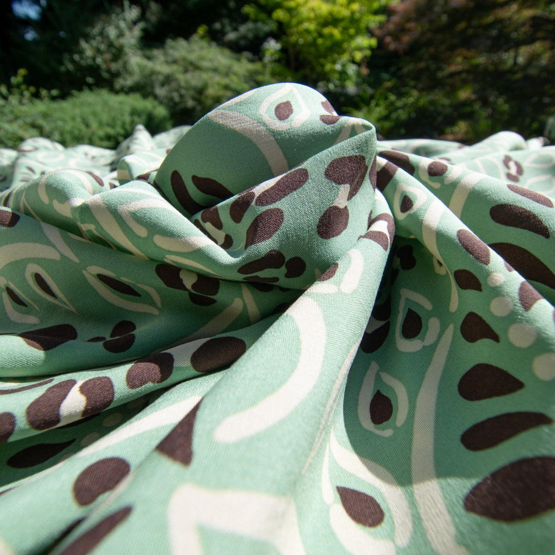 Viscose Voile Mint Chip Leaves fabric in mint green, chocolate brown, and cream, soft drape, 55-inch width