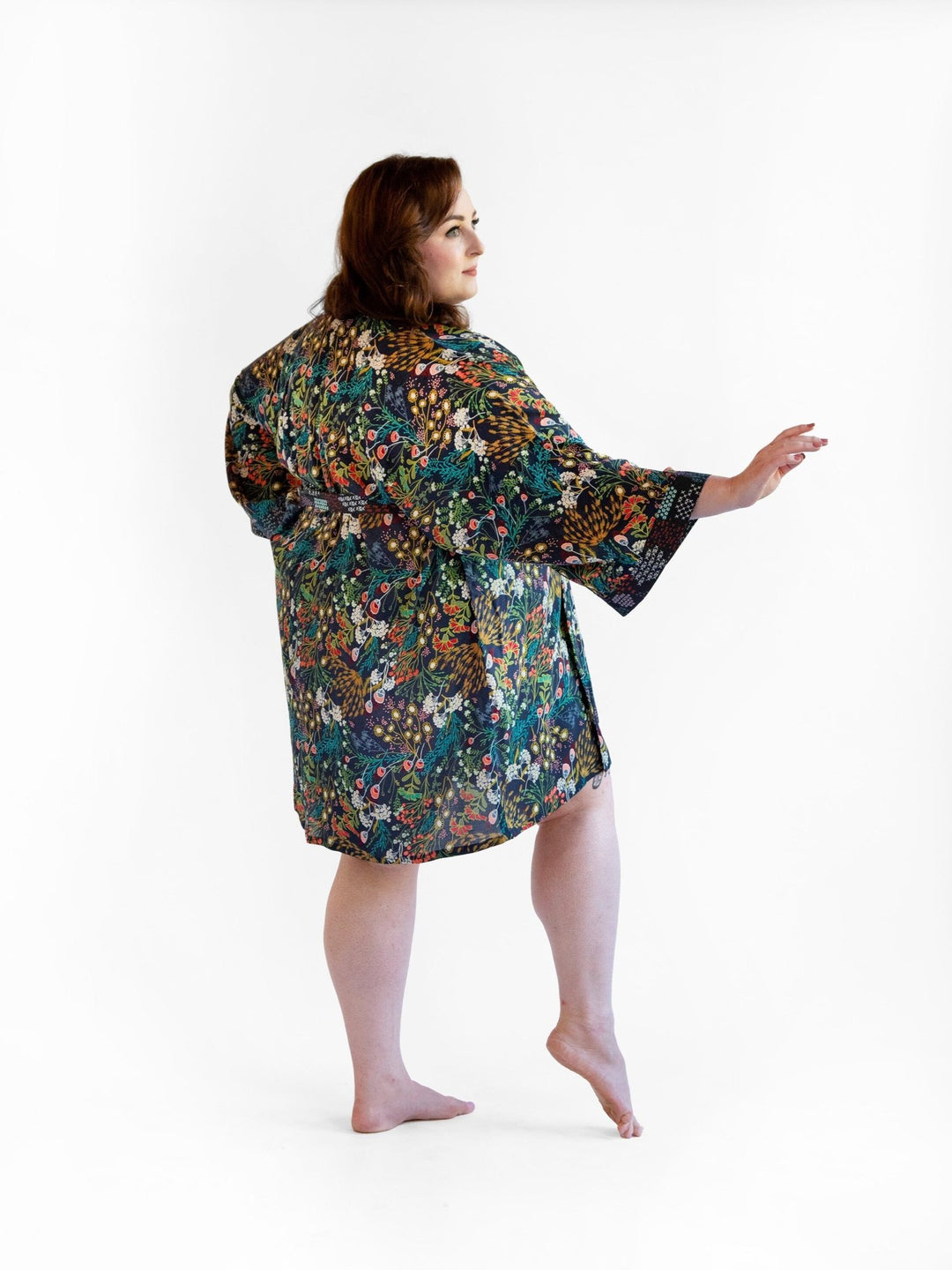Signature Robe in "Secret Garden" print, navy floral kimono-style bathrobe, lightweight rayon fabric with cotton edgings.