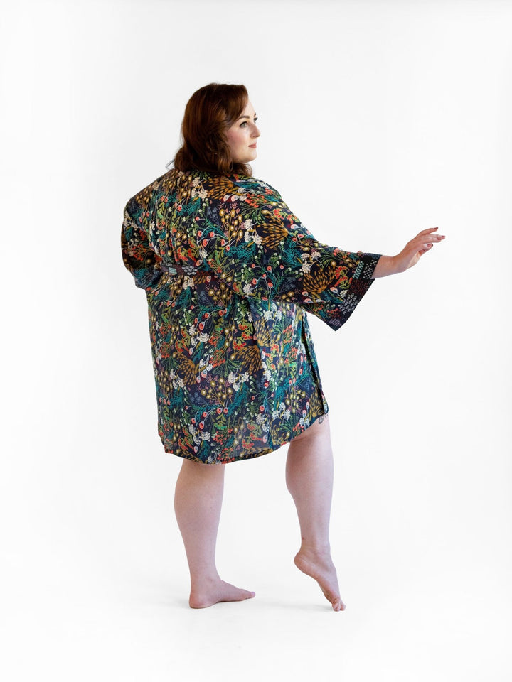 Signature Robe in "Secret Garden" print, navy floral kimono-style bathrobe, lightweight rayon fabric with cotton edgings.