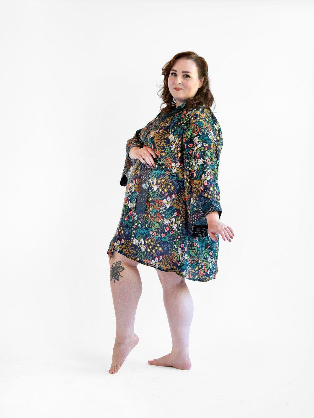 Signature Robe in "Secret Garden" print, navy floral kimono-style bathrobe, lightweight rayon fabric with cotton edgings.