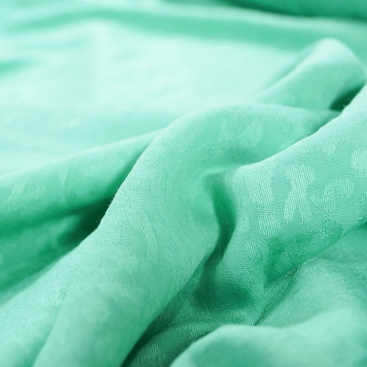 Rayon Jacquard Frosted Leopard Fabric in Seafoam Green with Textured Jacquard Pattern