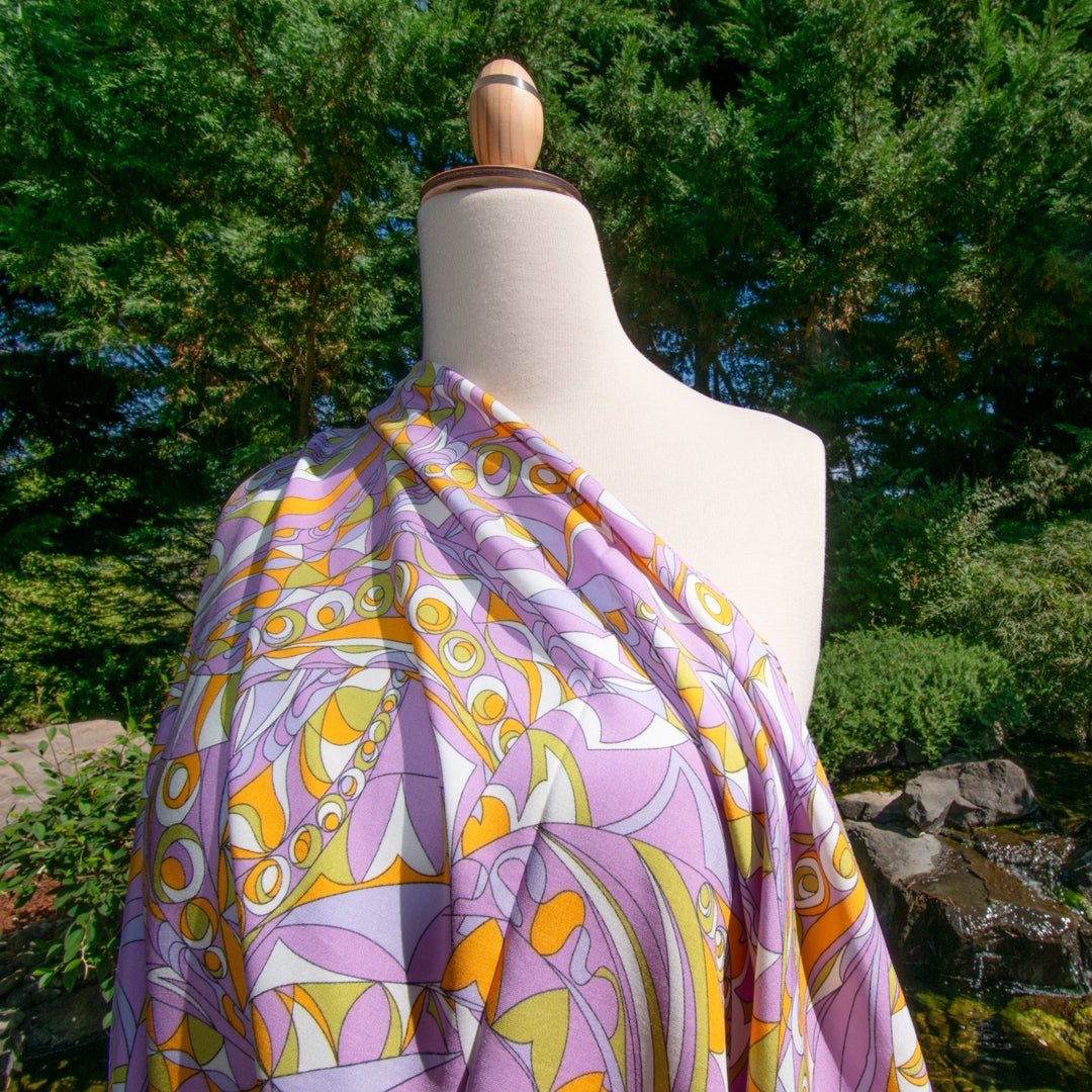 Retro Purple Mod Rayon Challis fabric, 100% rayon, OEKO-TEX certified, bold Pucci-inspired print, 55-inch width
