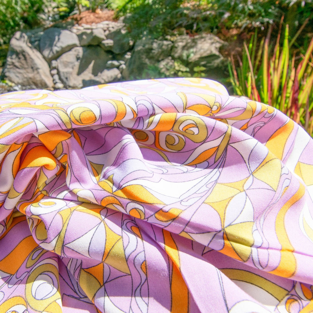 Retro Purple Mod Rayon Challis fabric, 100% rayon, OEKO-TEX certified, bold Pucci-inspired print, 55-inch width